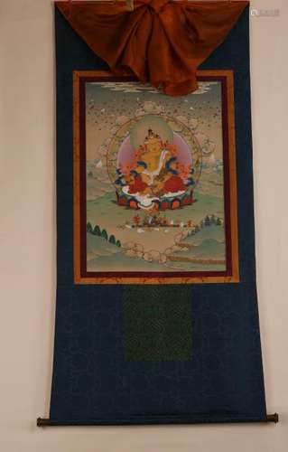 A THANGKA OF KUBERA.ANTIQUE