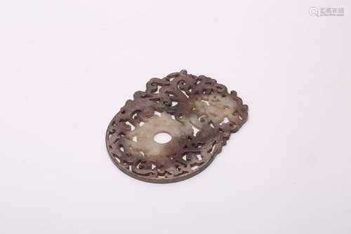 A CARVED JADE BI.ANTIQUE