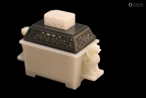 A WHITE JADE CARVING OF LIONHEAD CENSER AND