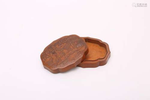 A CARVED BAMBOO BOX AND COVER.