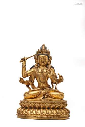 A GILT-BRONZE FIGURE OF MANJUSHRI.MING DYNASTY