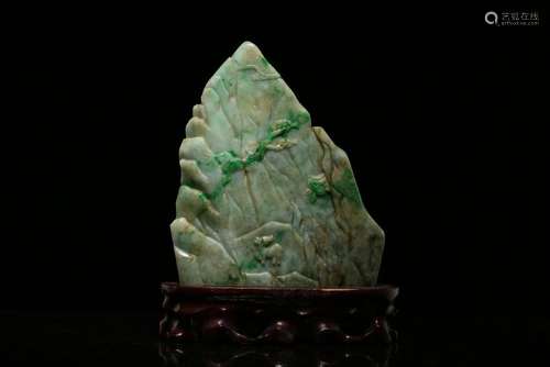 A CARVED JADEITE BOULDER.ANTIQUE