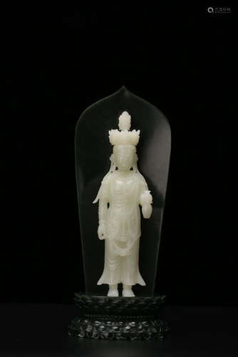 A CARVED WHITE JADE-SPINACH GREEN JADE GUANYIN AND