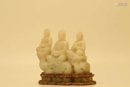 A WHITE JADE CARVING OF THREE BUDDHAS.ANTIQUE