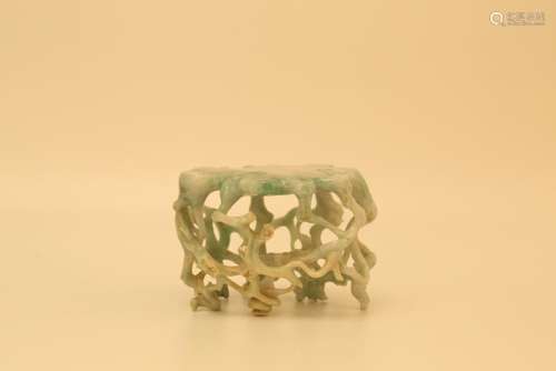 A CAEVED JADEITE STAND .ANTIQUE