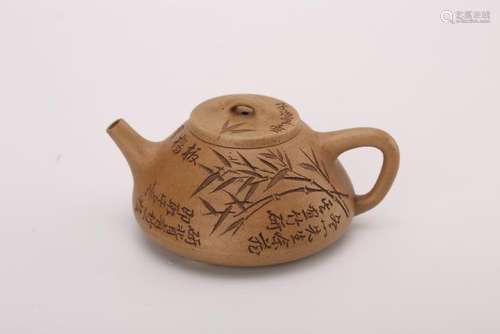 A YIXING TEAPOT AND COVER.