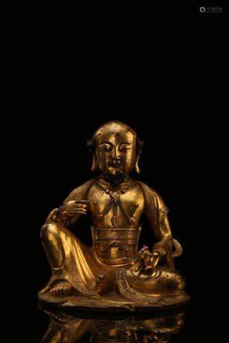 A GILT-BRONZE FIGURE OF DAMO .QING DYNASTY