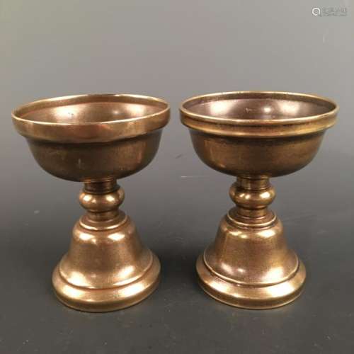A Pair of Chinese Bronze Candle Holder