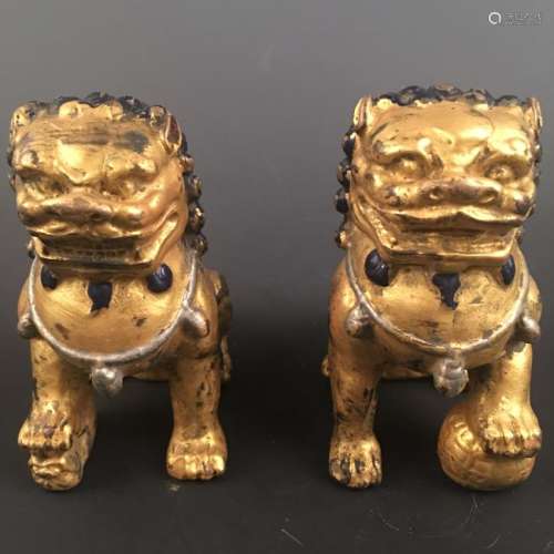 A Pair of Chinese Gilt Bronze Lion Figure