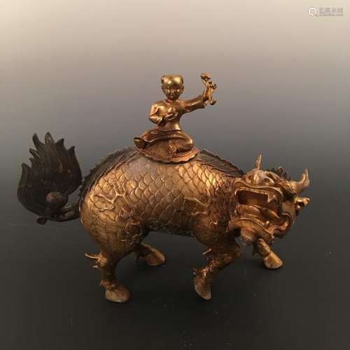 A Rare Chinese Gilt Brass Kirin-Give-away-baby Statue