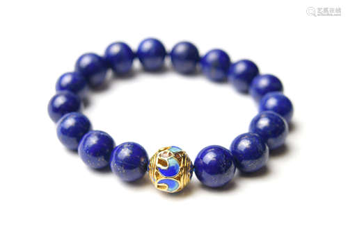 A Natural Blue Lazurite Bead Bracelet with a Cloisonne Leading Bead