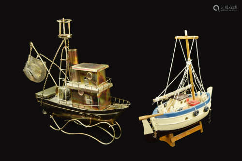 Two Pieces of Wood and Metal Boat Models