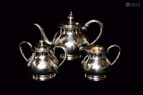 A Chinese Exporting Silver Tea Set with Dragon Pattern and Hallmark at the Bottom (3 pcs)