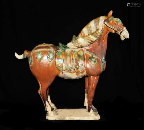 A Chinese Tang Style Tri-Colour Pottery Horse Statue