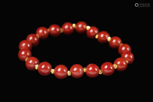 An Old Red Glass Bead Bracelet