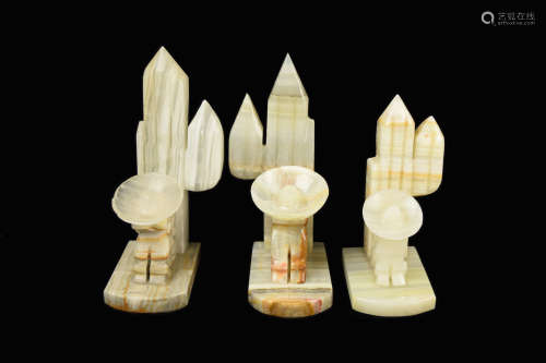 A Set of Marble Bookend Carved with Cactus and Mexicans