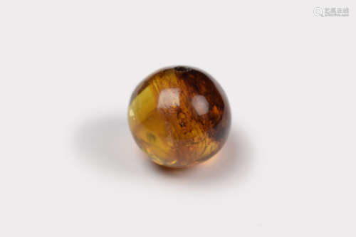A Myanmarese Blue Amber Ball