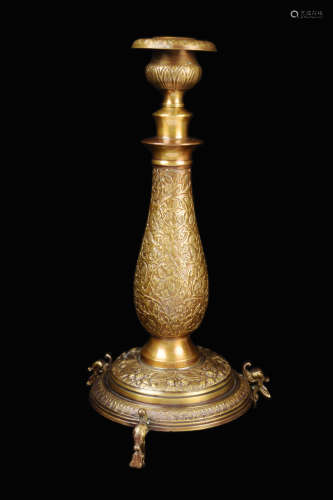 A Bronze Claw foot Candle Stick with Filigree