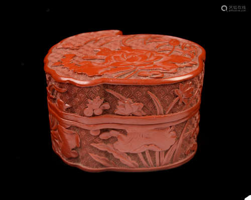 [Chinese] A Cinnabar Lacquered Wood Lotus Leaf Shape Box with Mandarin Duck Carvings