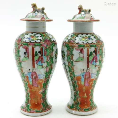 A Pair of Cantonese Vases with Covers