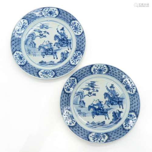 A Pair of Blue and White Decor Plates