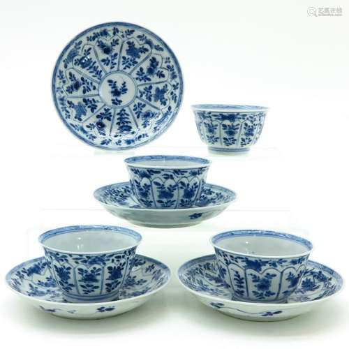 Four Blue and White Decor Cups and Saucers