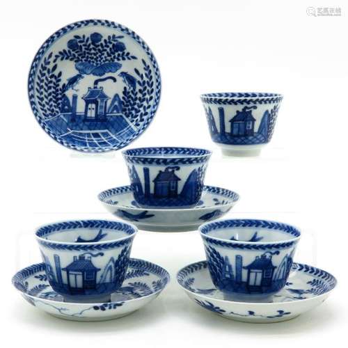 Four Blue and White Decor Cups and Saucers