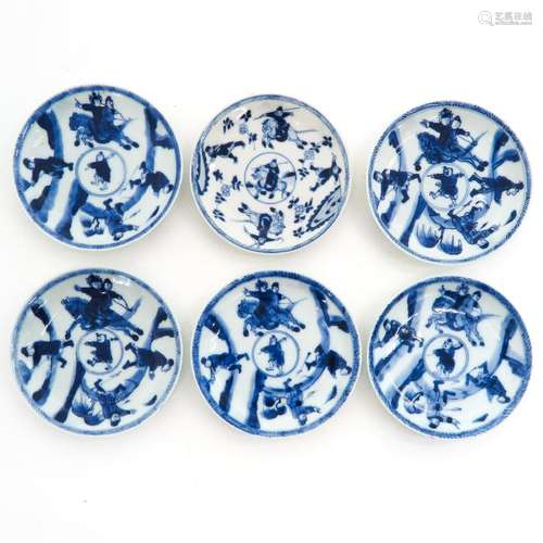 A Collection of Six Blue and White Saucers