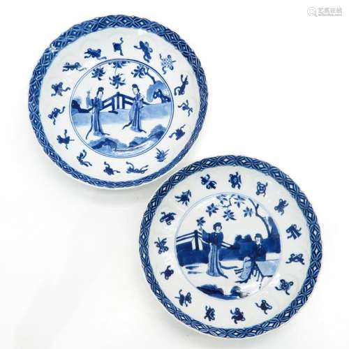 A Pair of Blue and White Decor Plates