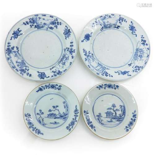 A Diverse Lot of Four Blue and White Decor Plates