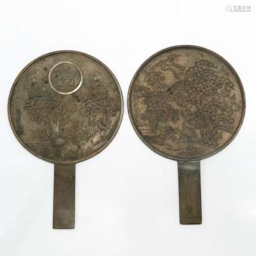 A Pair of Bronze Japanese Hand Mirrors