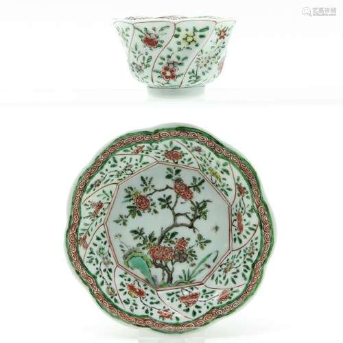 A Polychrome Decor Cup and Saucer