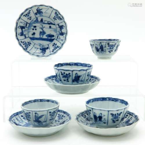 Four Blue and White Decor Cups and Saucers