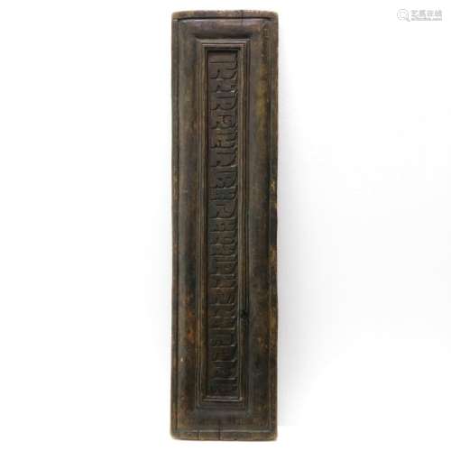 A Carved Tibetan Reading Board