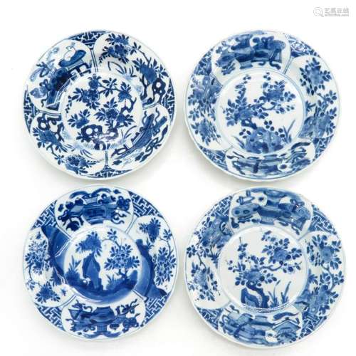 A Series of Four Blue and White Plates