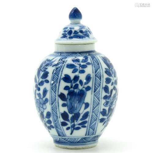 A Small Blue and White Decor Vase with Cover