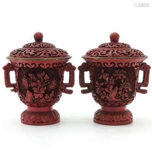 A Pair of Cinnabar Vases with Covers