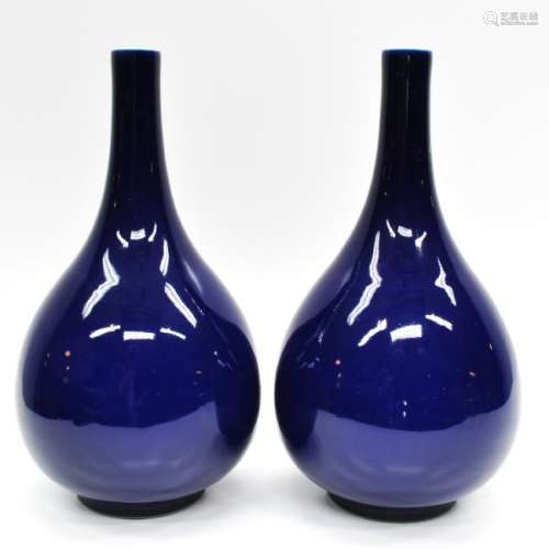 A Pair of Monochrome Blue Bottle Vases