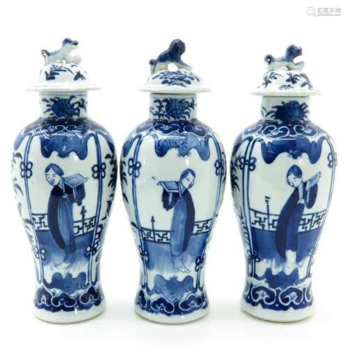 Three Blue and White Garniture Vases