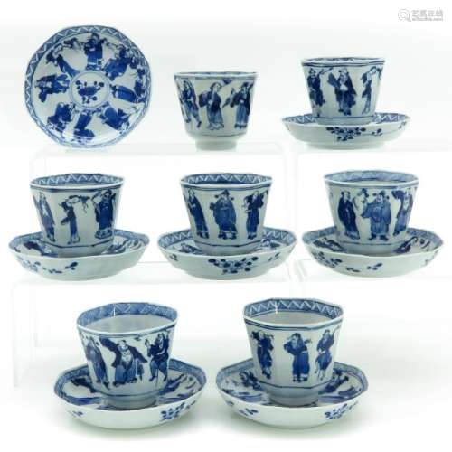 A Set of Seven Blue and White Decor Cups and Saucers