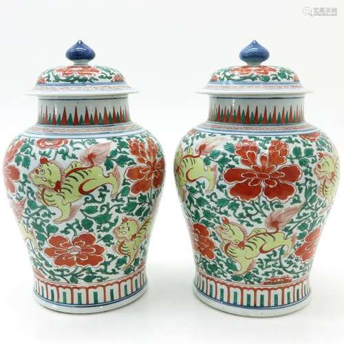 A Pair of Polychrome Decor Temple Jars