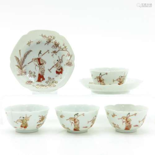 A Collection of Milk and Blood Decor Cups and Saucers