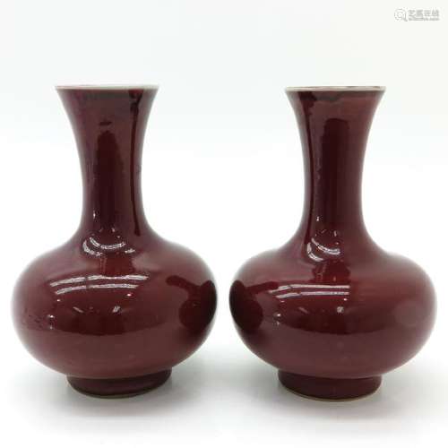 A Pair of Sang de Boeuf Decor Vases