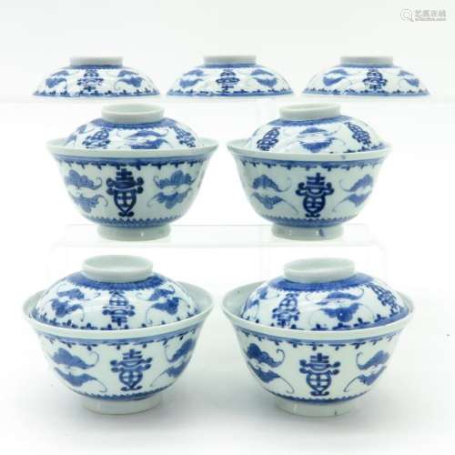 A Series of Blue and White Bowls with Covers