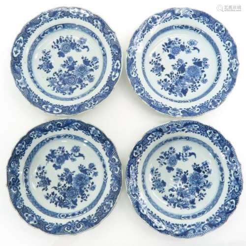 A Series of Four Blue and White Decor Plates