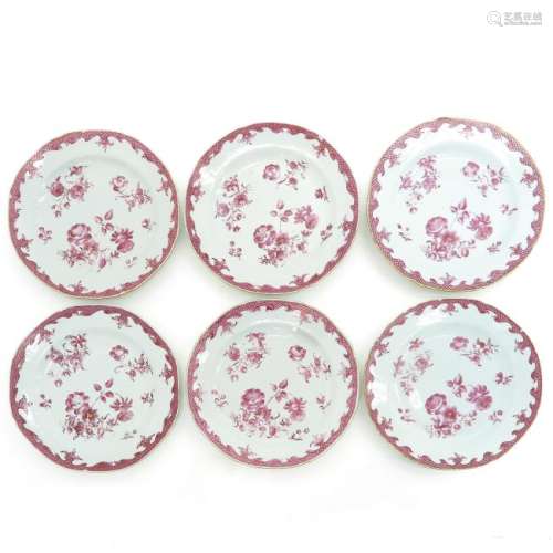 A Series of Six Pink Floral Decor Plates