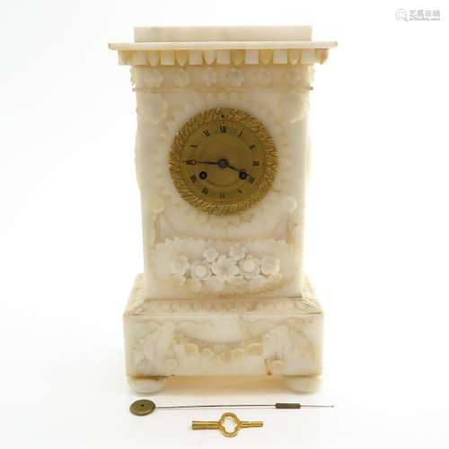 A Carved Alabaster Pendule