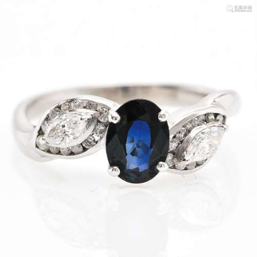 A 9KWG Ladies Diamond and Sapphire Ring