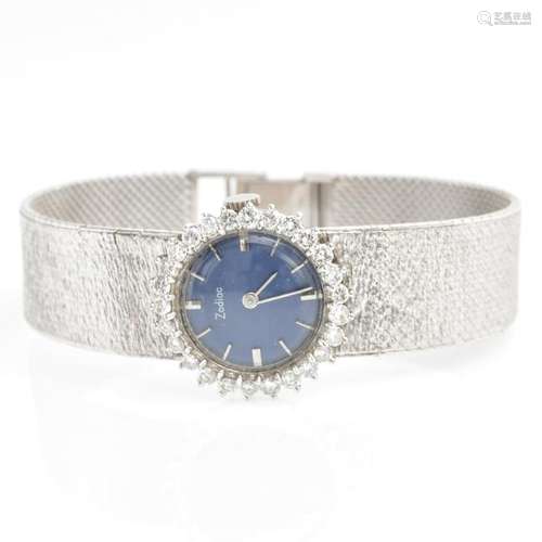 A Ladies 18KWG Diamond Zodiac Watch