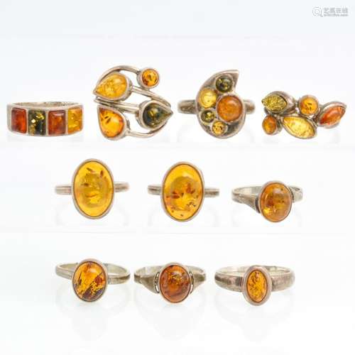 A Collection of 10 Silver Rings with Amber